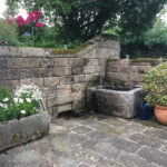 A Stunning courtyard of stone troughs in Yorkshire Dales